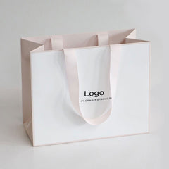 Customizable white and pink paper bags